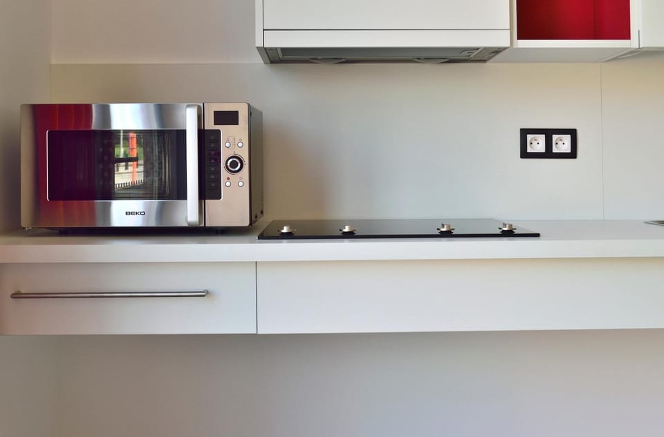 Kitchen or kitchenette, oven, stove