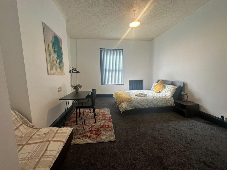 Bed, Living room, Seating area