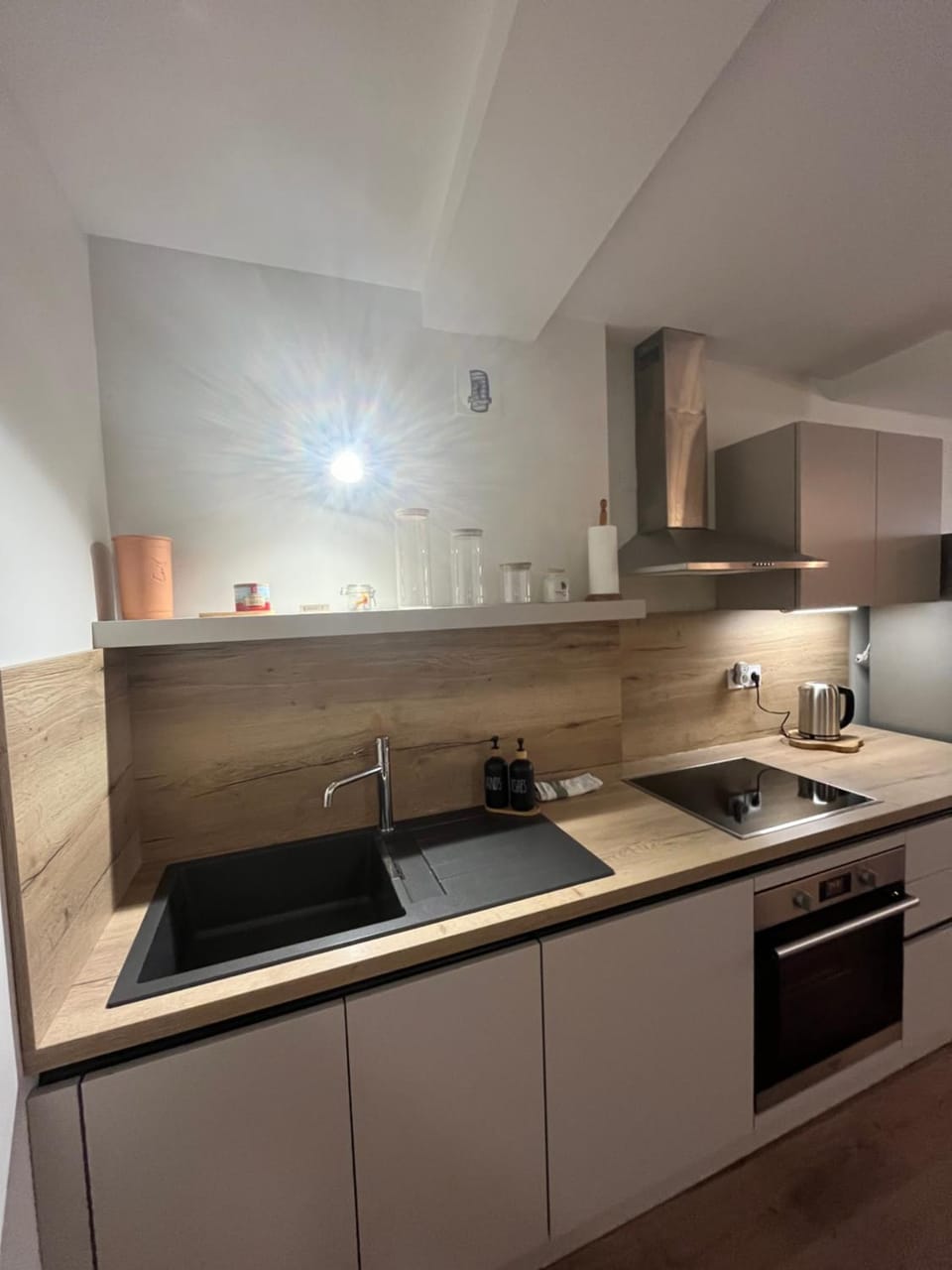 Kitchen or kitchenette, dishwasher, oven, stove
