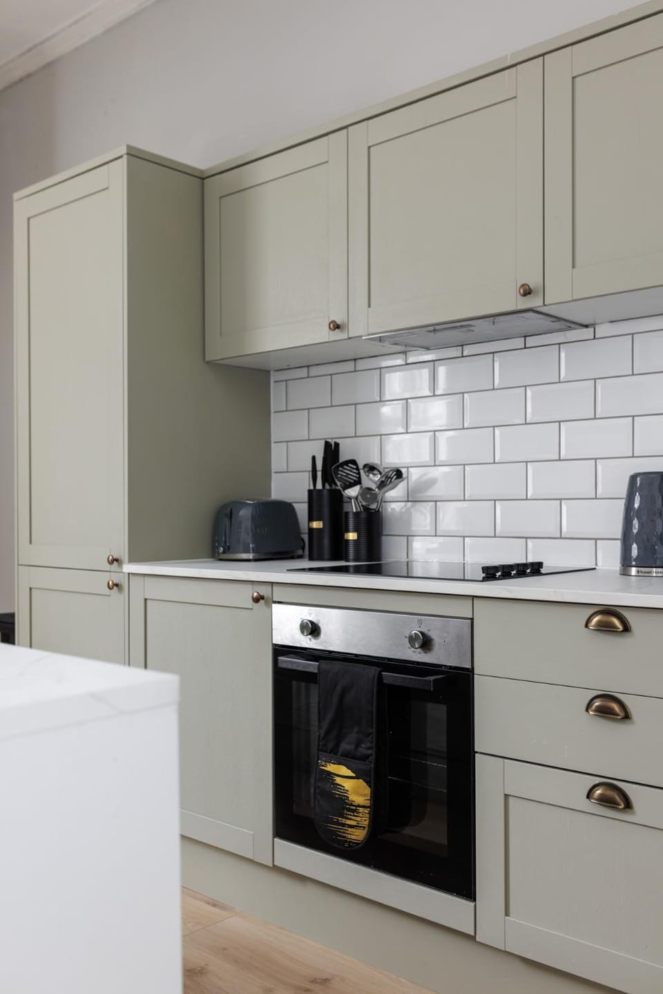 Kitchen or kitchenette, stove, toaster