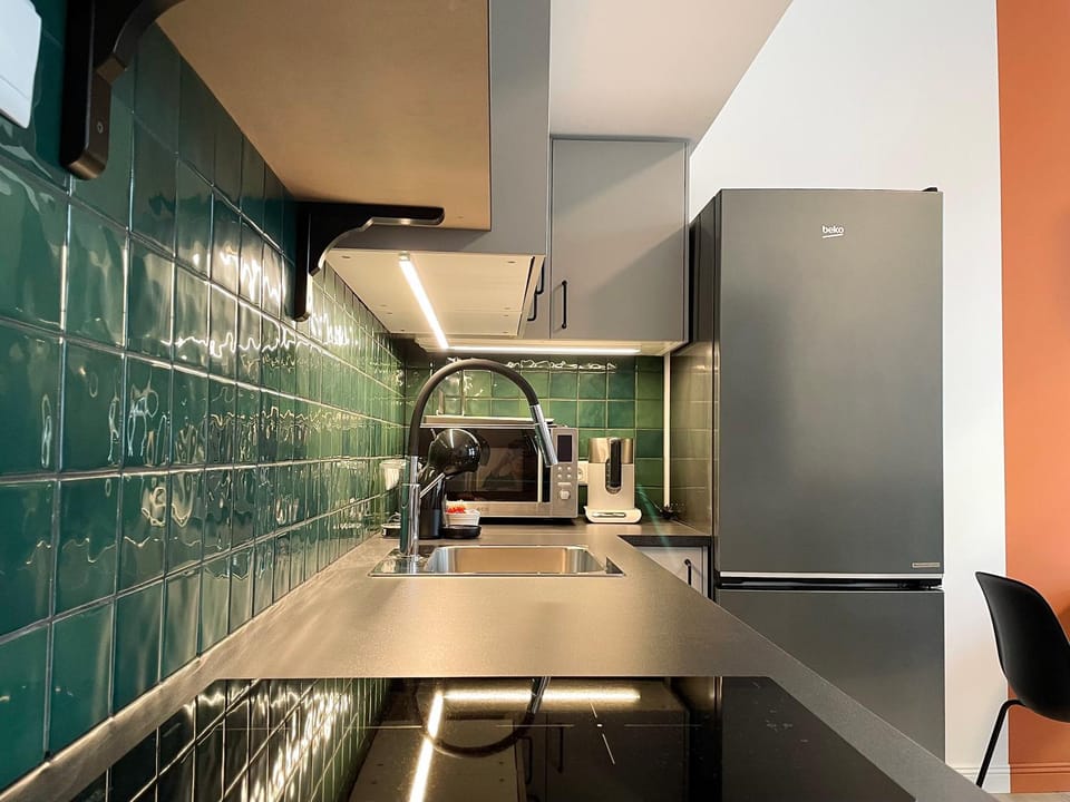 Kitchen or kitchenette, oven