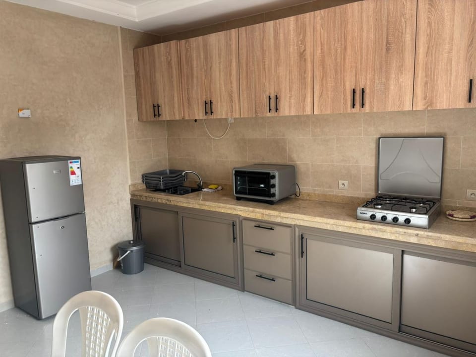 Kitchen or kitchenette, stove
