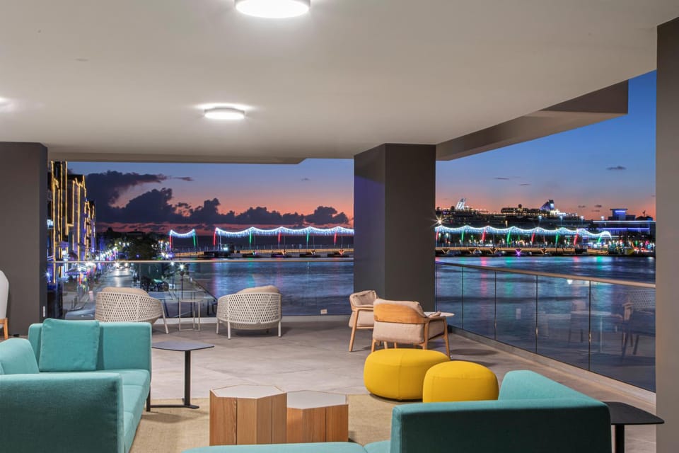 Property building, Lobby or reception, Seating area, City view, Sea view, Street view