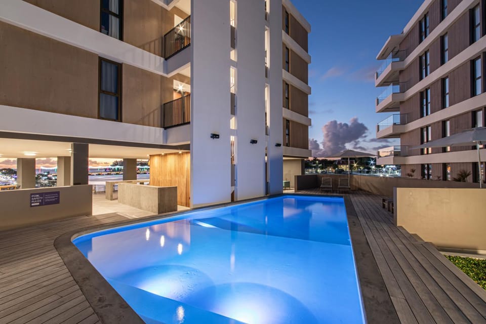 Property building, Night, Pool view, Swimming pool, sunbed