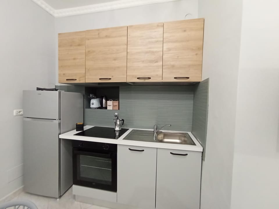 Kitchen or kitchenette, oven, stove