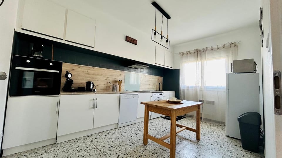 Dining area, dishwasher, oven, stove