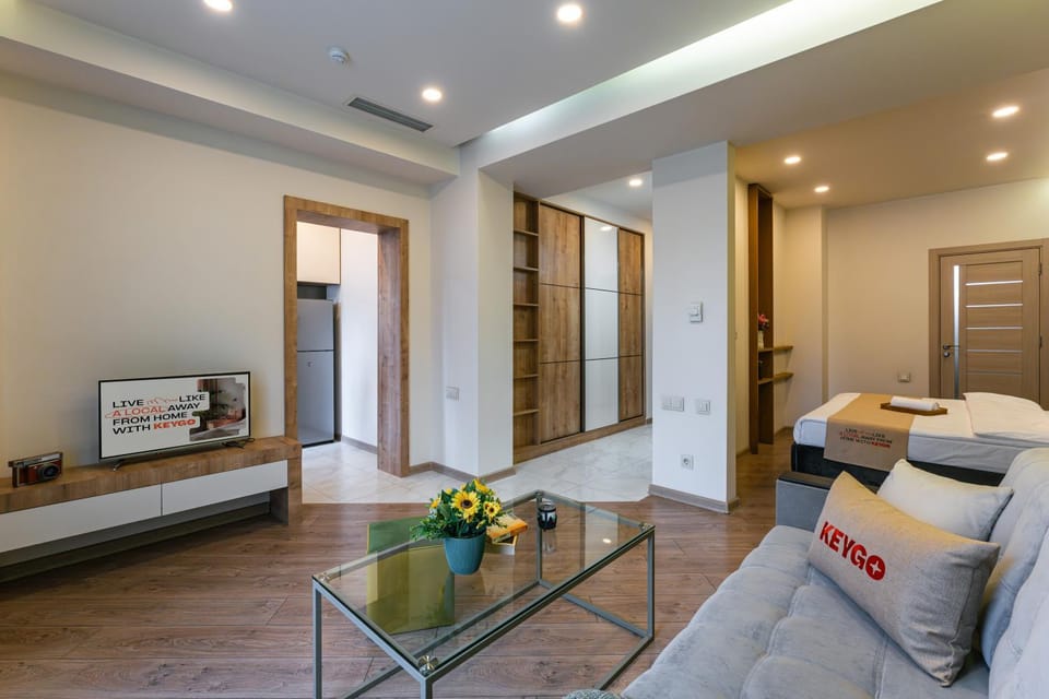 Bed, TV and multimedia, Living room, Seating area, Bedroom, wardrobe