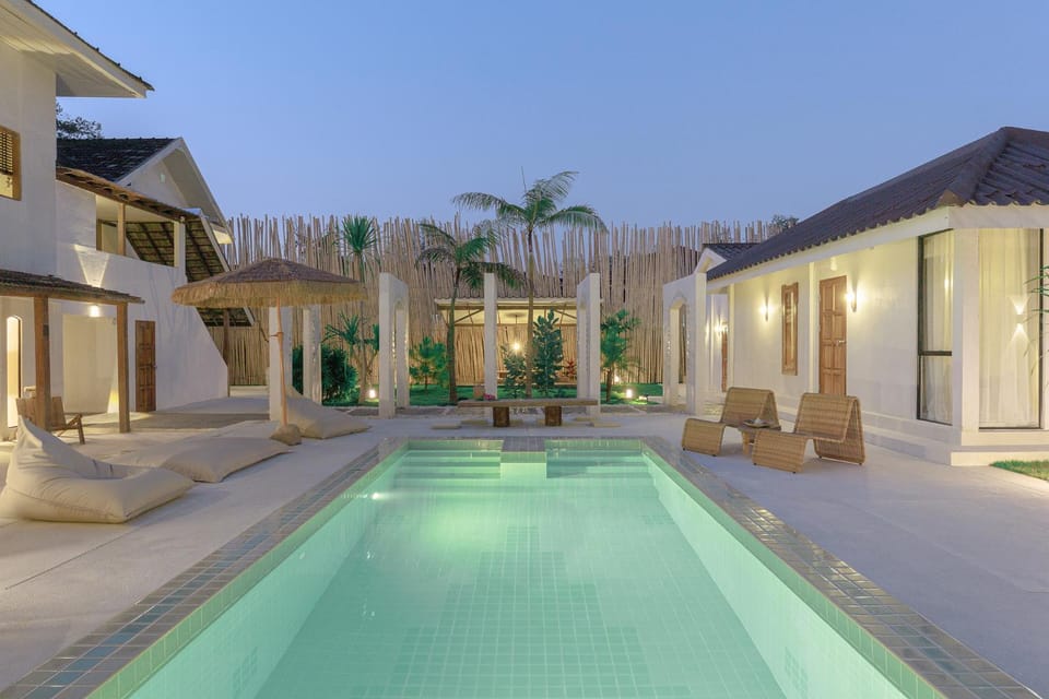 Property building, Patio, Day, Night, Pool view, Swimming pool, sunbed