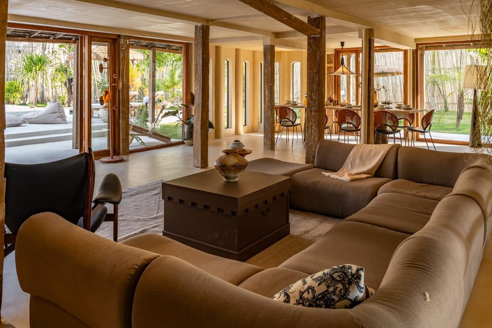 Living room, Seating area, Garden view, Pool view