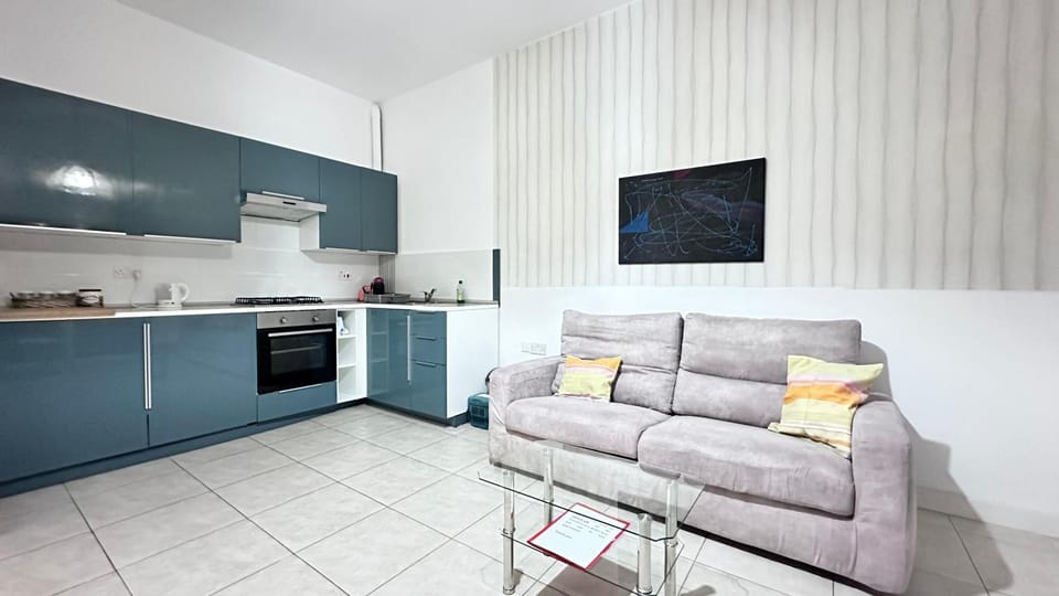 Kitchen or kitchenette, Living room, Seating area, oven, stove, toaster