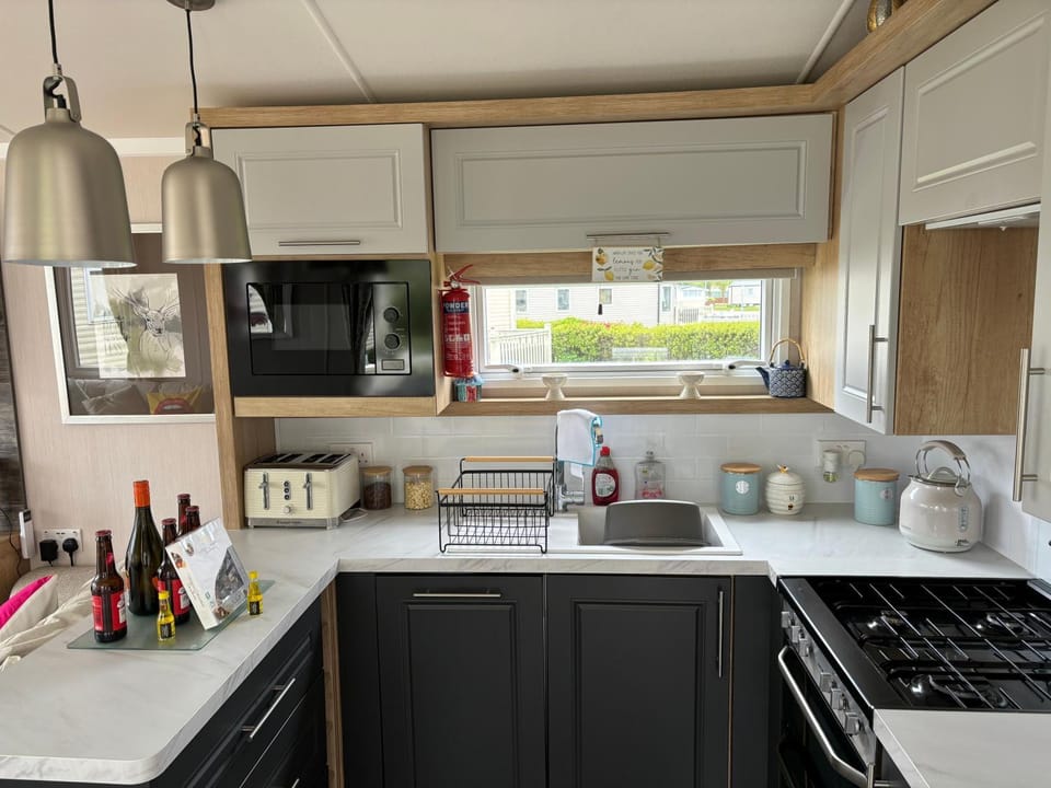 Kitchen or kitchenette, stove