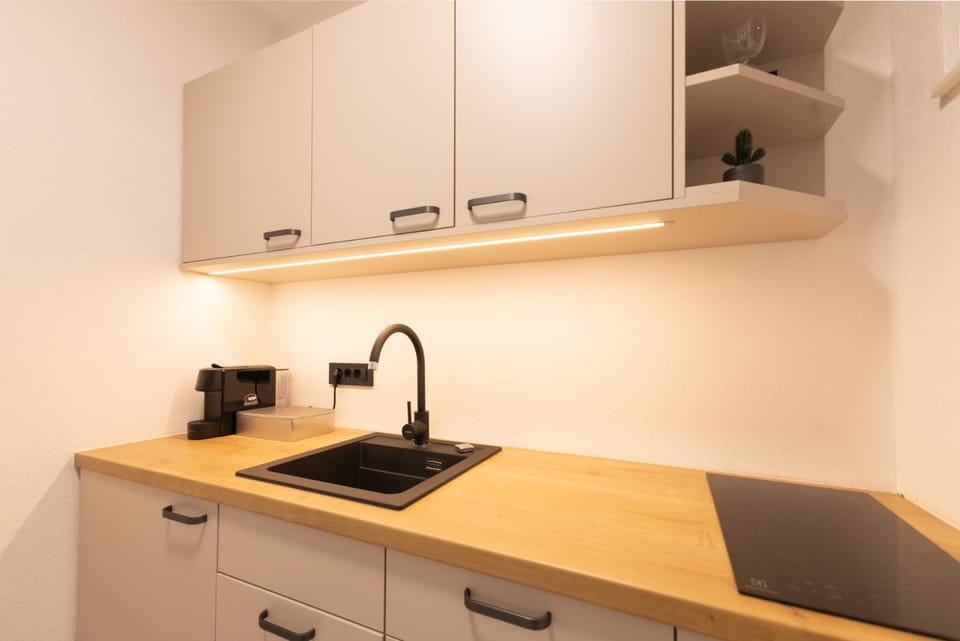 Kitchen or kitchenette, stove, kitchen