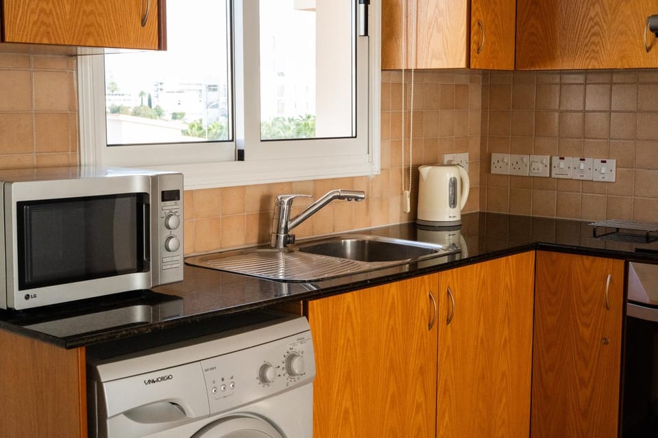 Kitchen or kitchenette, oven, stove