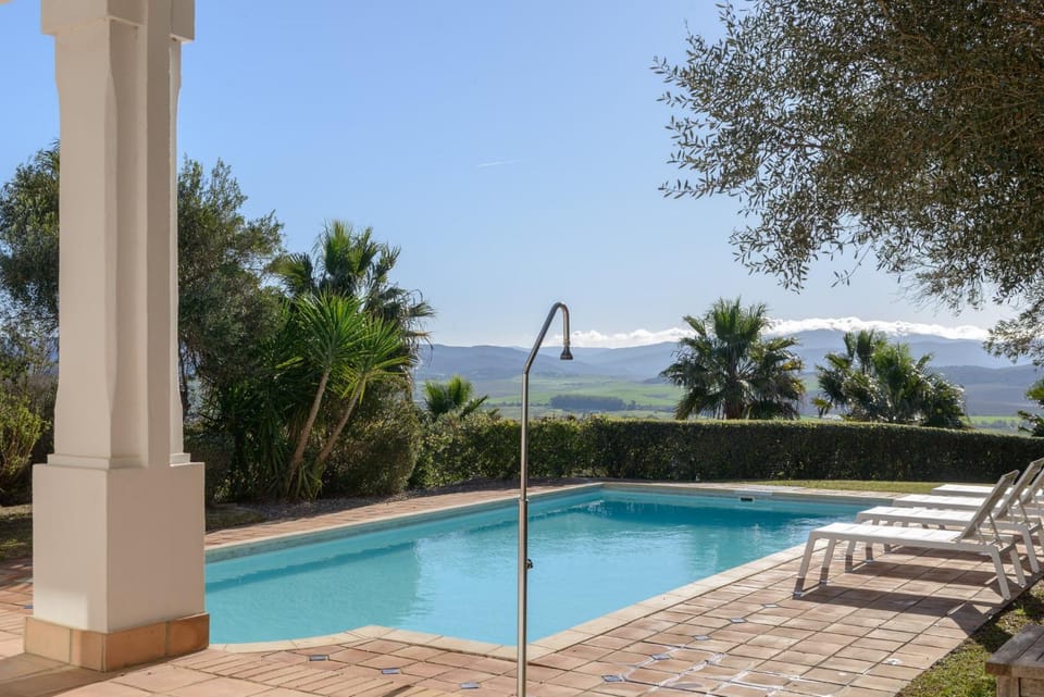 Property building, Living room, Swimming pool