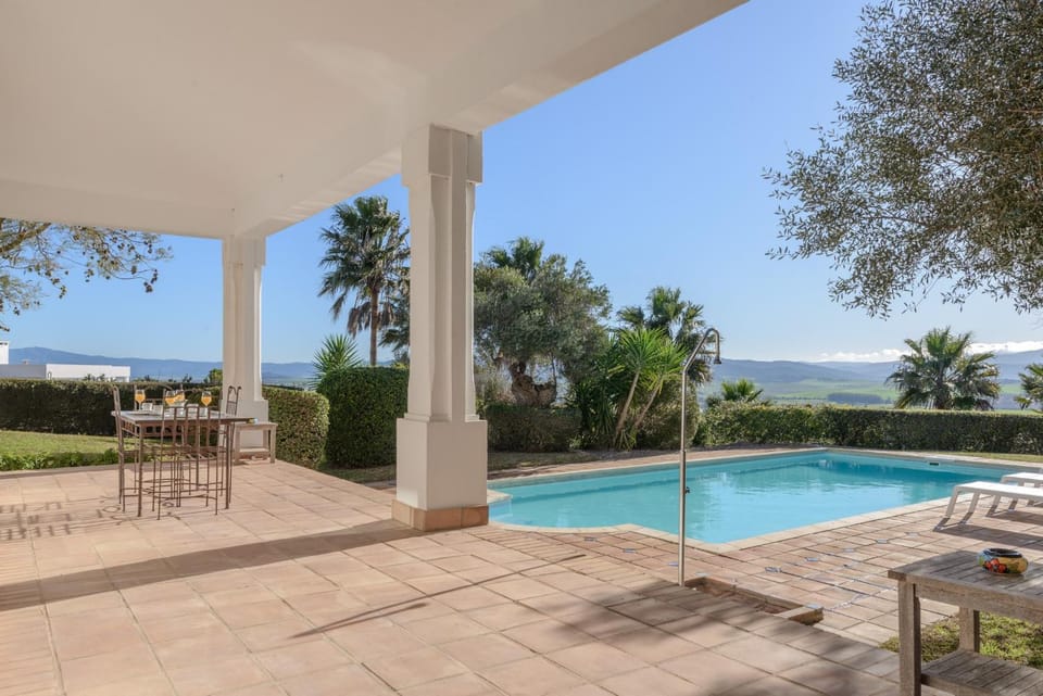 Property building, Living room, Swimming pool
