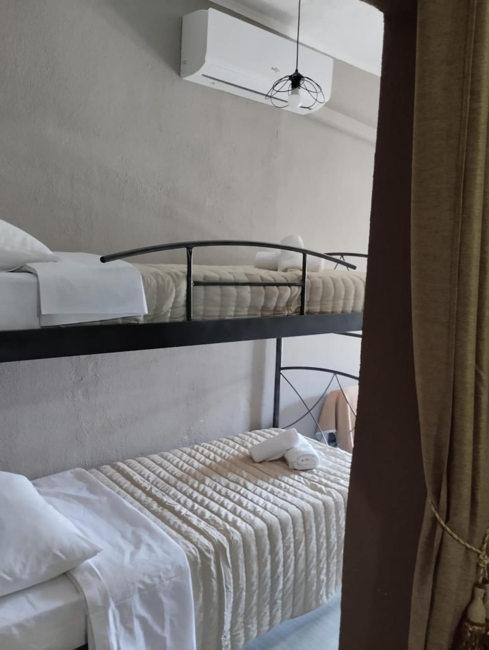 Bed, Photo of the whole room, Bedroom, bunk bed, towels, air conditioner