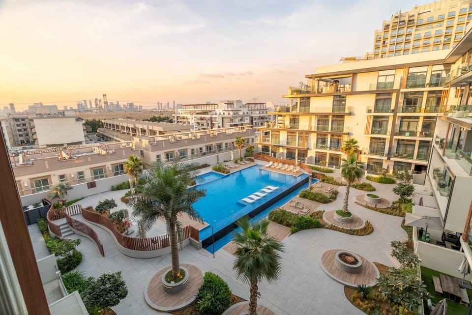 GuestReady - Modern 1BR w/ Balcony Facing Pool Apartment in Dubai