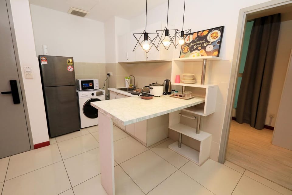 Kitchen or kitchenette, dishwasher, oven, stove