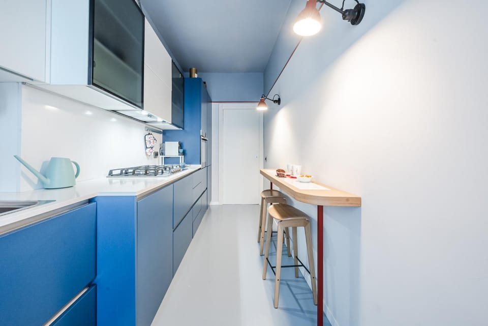 Kitchen or kitchenette, dishwasher, oven, stove