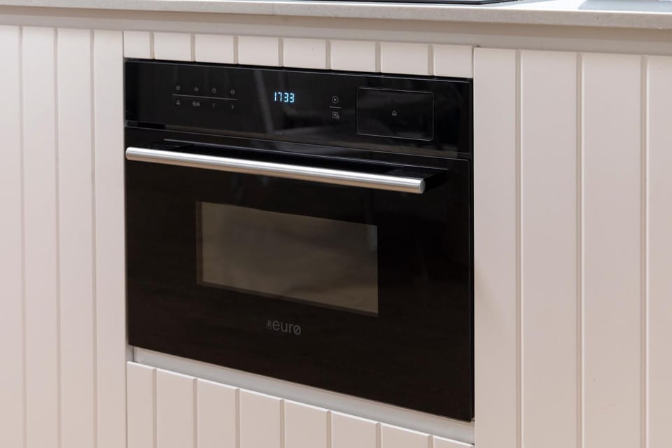 Kitchen or kitchenette, oven