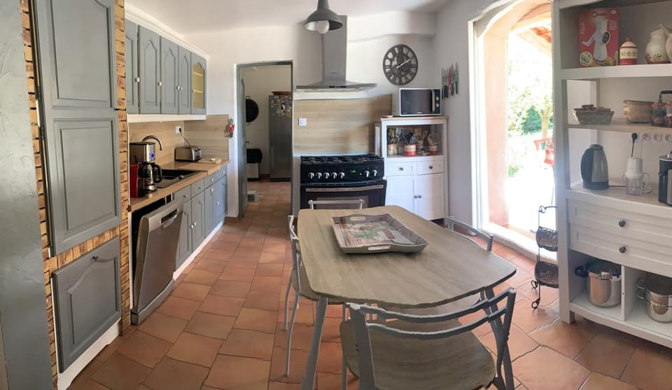 Kitchen or kitchenette, dishwasher, oven, stove, toaster