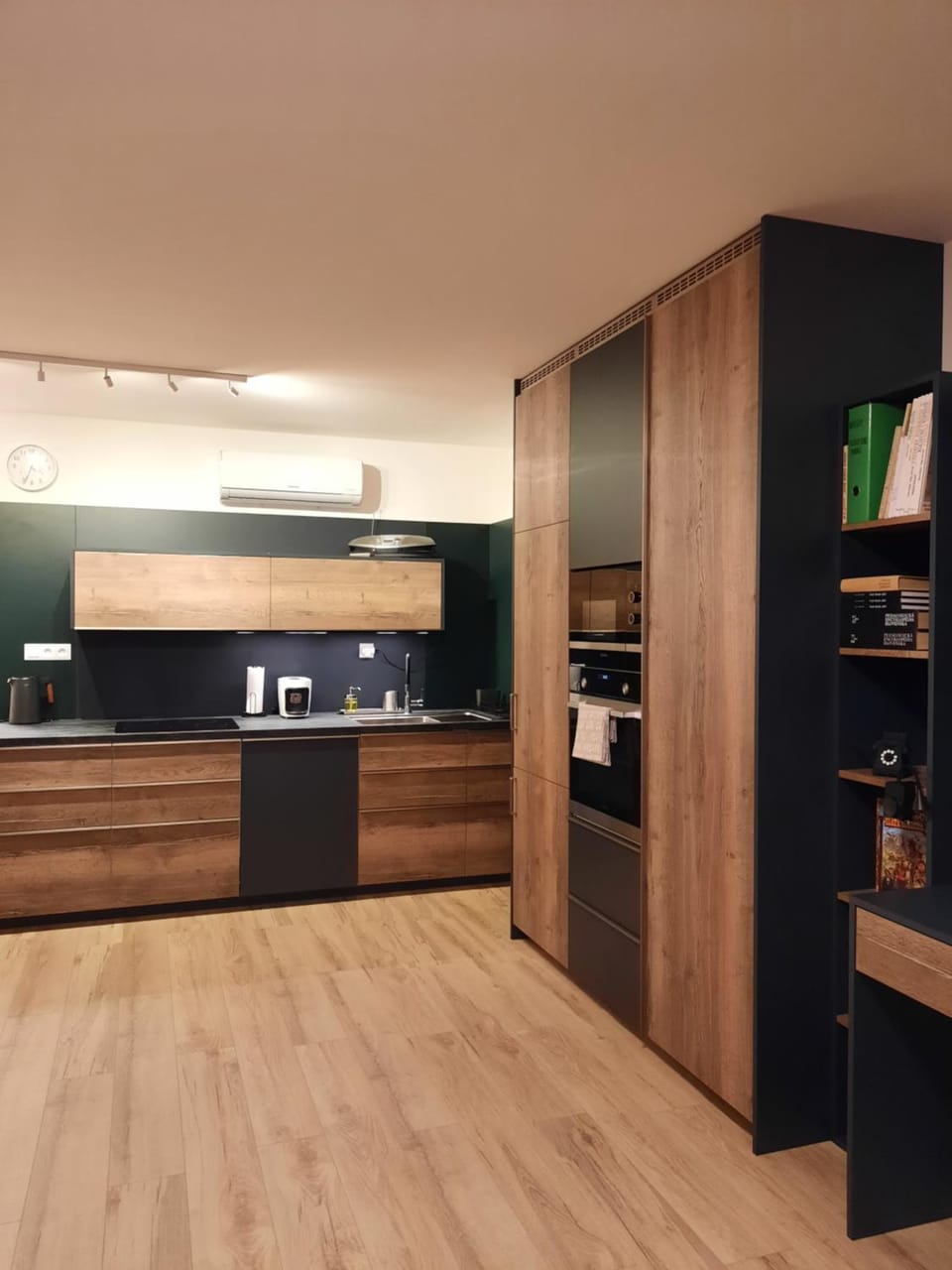 Kitchen or kitchenette, dishwasher, flat iron, microwave, oven, stove, toaster, air conditioner, air conditioner