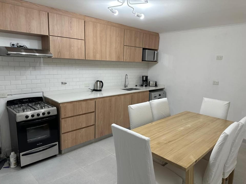 Kitchen or kitchenette, Dining area, stove, toaster