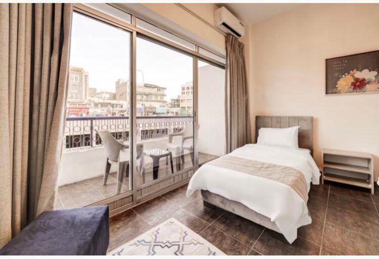 Bed, View (from property/room), Balcony/Terrace, Photo of the whole room, Seating area, Dining area, Bedroom, air conditioner