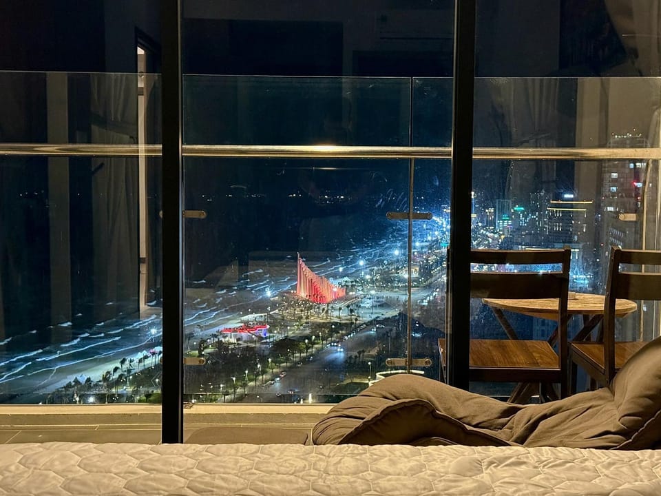 Night, View (from property/room), Balcony/Terrace, Living room, Seating area, City view