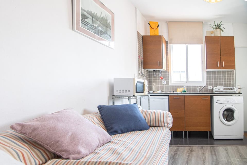 Kitchen or kitchenette, washing machine