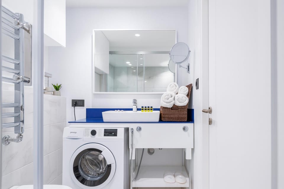 Shower, Bathroom, towels, washing machine, dryer