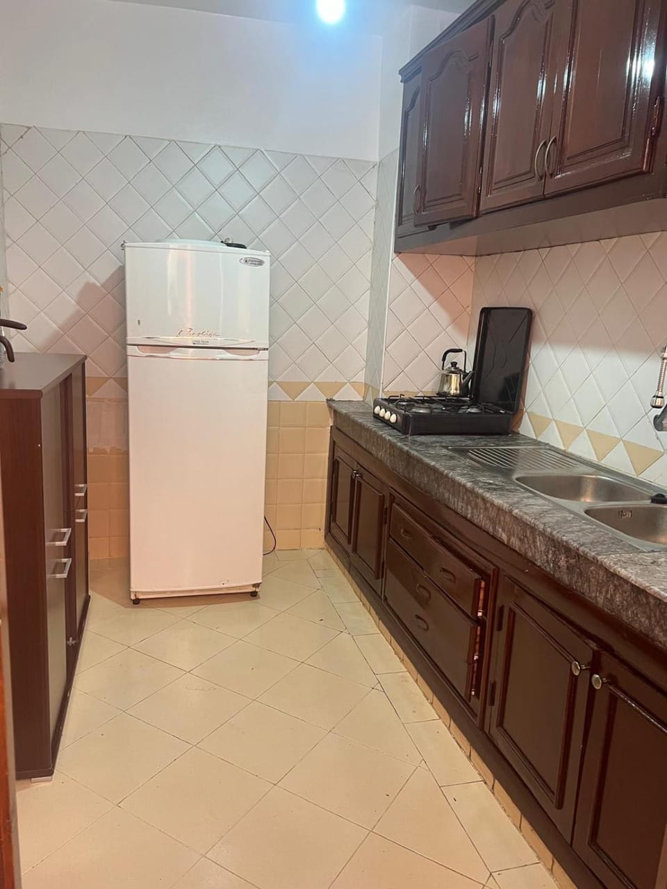 Kitchen or kitchenette, oven