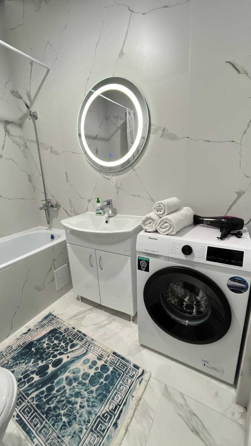 Bathroom, towels, washing machine