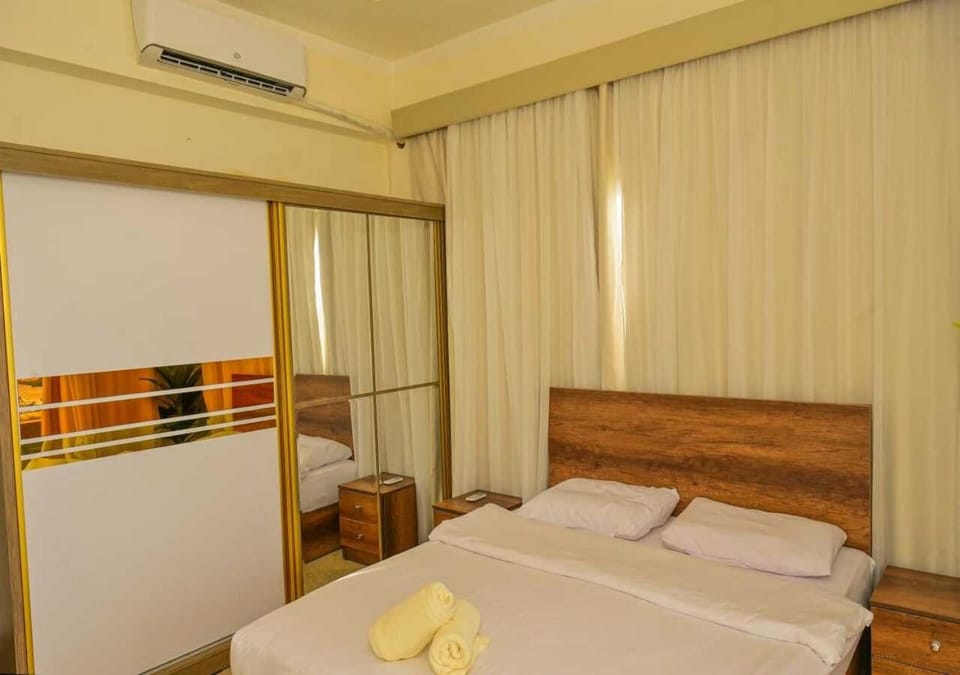 Bed, Photo of the whole room, Bedroom, towels, air conditioner