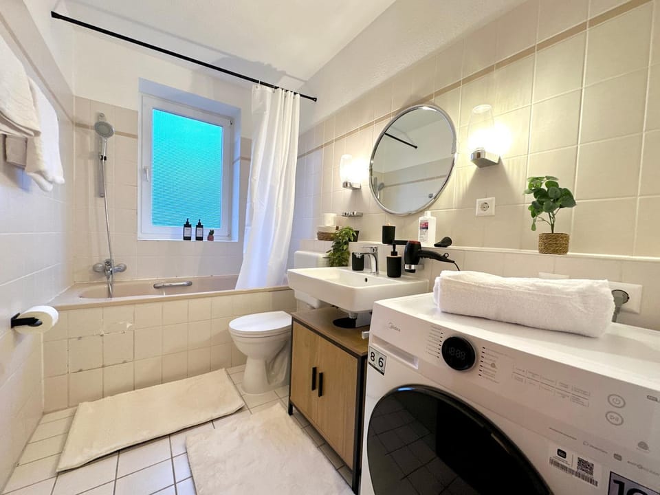 Shower, Toilet, Bathroom, Bath, towels, washing machine, dryer
