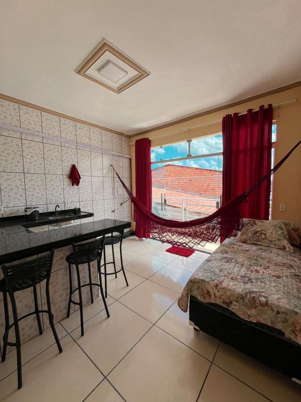 Bed, Living room, Seating area, Dining area