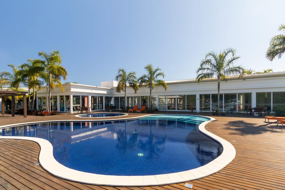 Property building, Day, Pool view, Swimming pool, sunbed