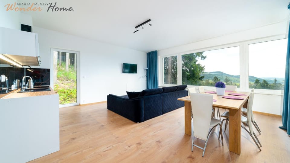 Kitchen or kitchenette, Living room, Seating area, Dining area