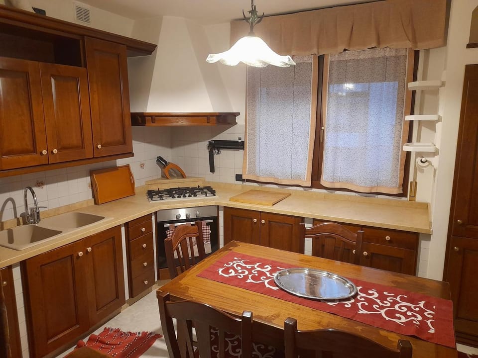 Kitchen or kitchenette, dishwasher, microwave, oven