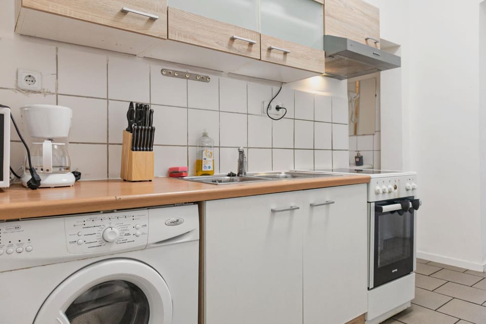 Kitchen or kitchenette, washing machine