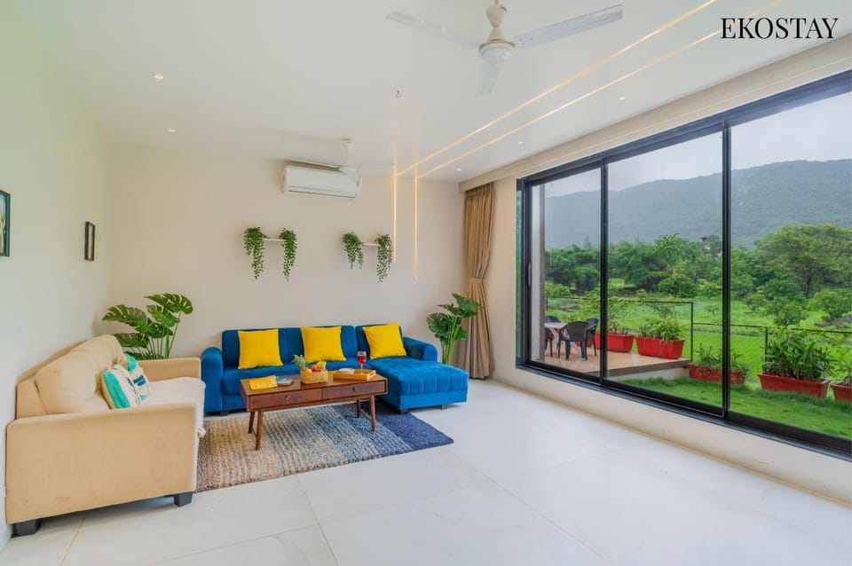 Natural landscape, Living room, Seating area, Mountain view, air conditioner
