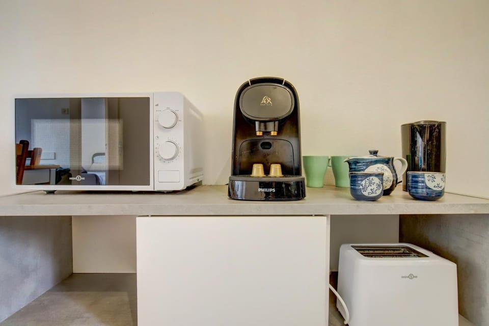 Coffee/tea facilities, Kitchen or kitchenette, minibar, oven, toaster