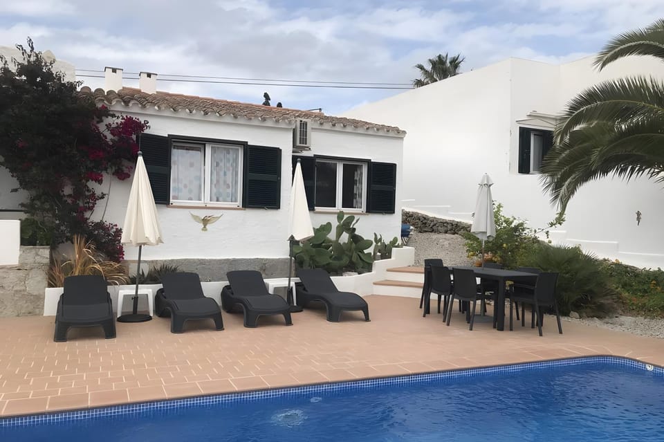 Property building, Living room, Swimming pool