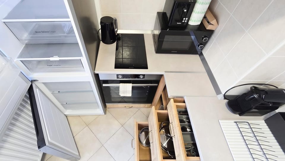Kitchen or kitchenette, oven, stove