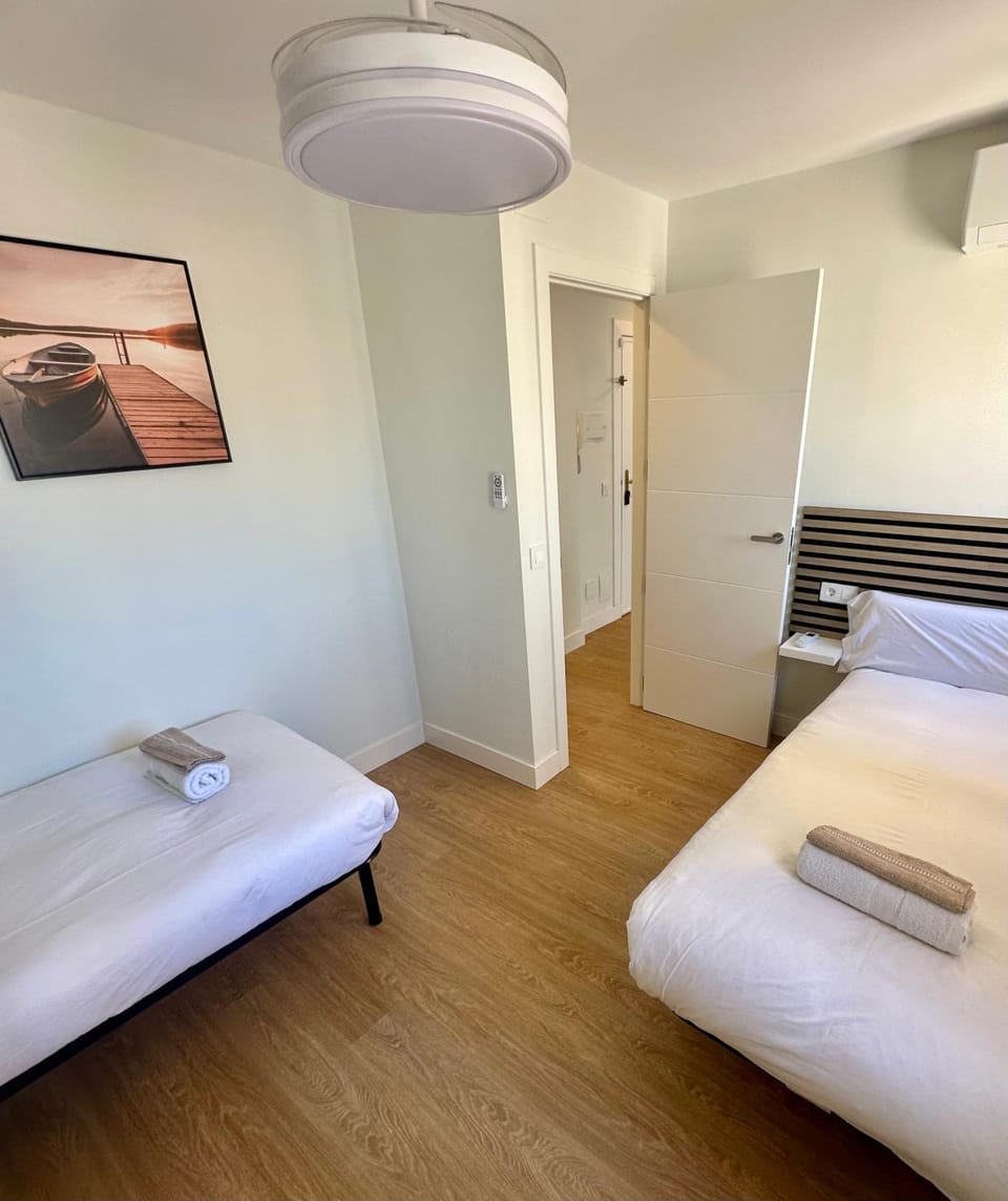 Bed, Photo of the whole room, Bedroom, towels, air conditioner