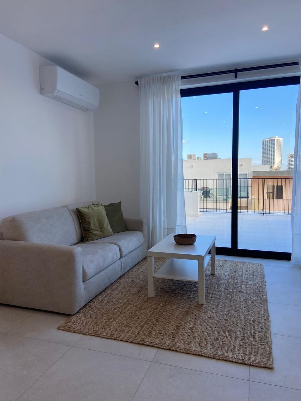 View (from property/room), Balcony/Terrace, Living room, Seating area, air conditioner