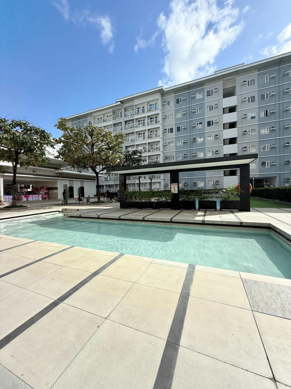 Property building, Day, Pool view, Swimming pool