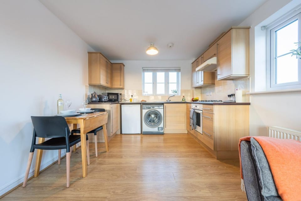 Kitchen or kitchenette, stove, washing machine, kitchen