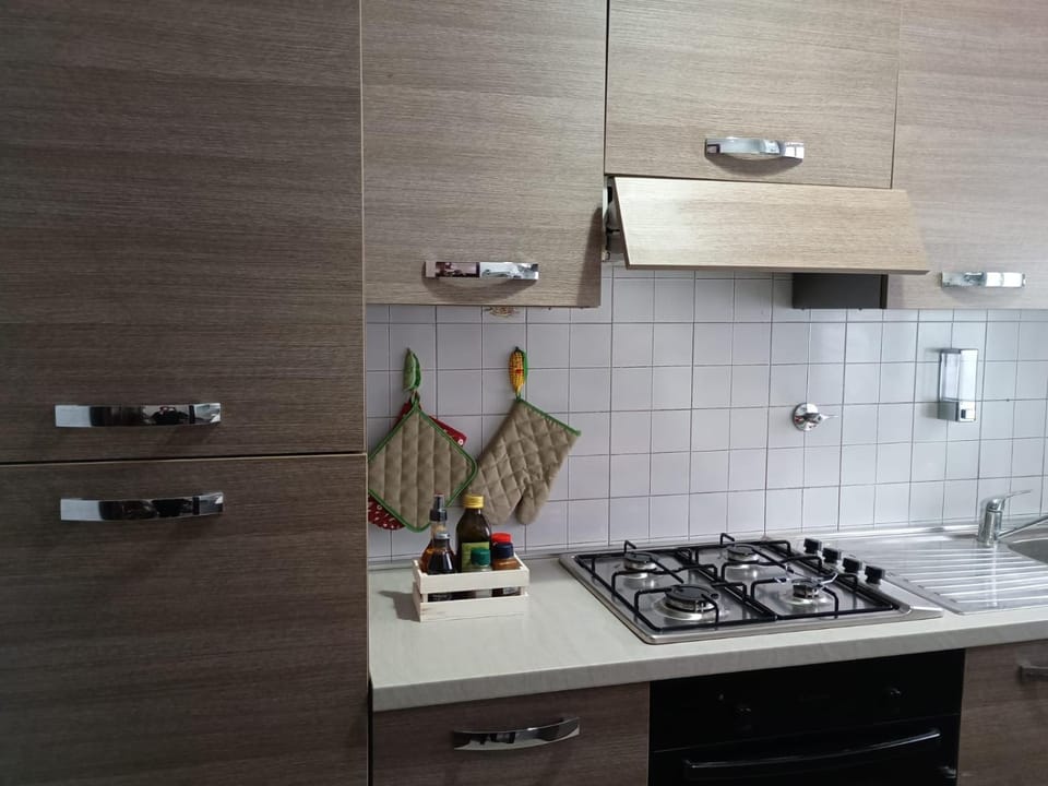 Kitchen or kitchenette, stove