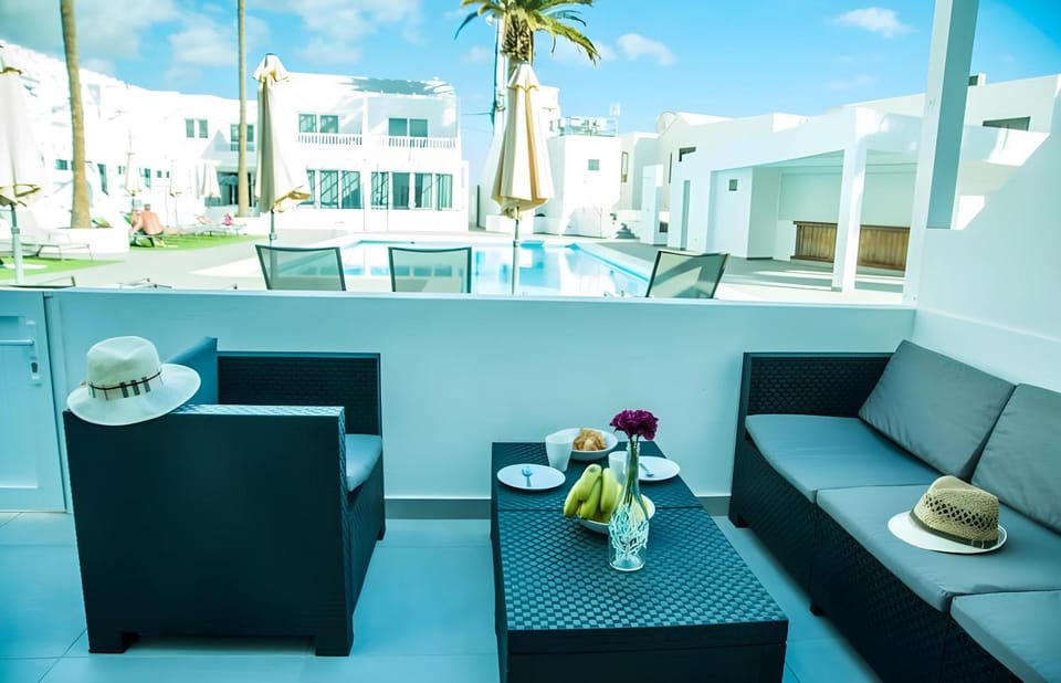 Patio, Patio, Seating area, Dining area, Pool view